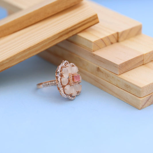 "Elegant Rose Gold Floral Ring with Pink Gemstone & White Accents"