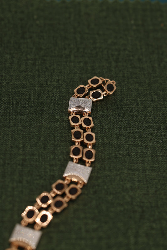 Gold and Black Rudraksha Bracelet with Textured Accent Bars – Spiritual Energy and Elegant Style