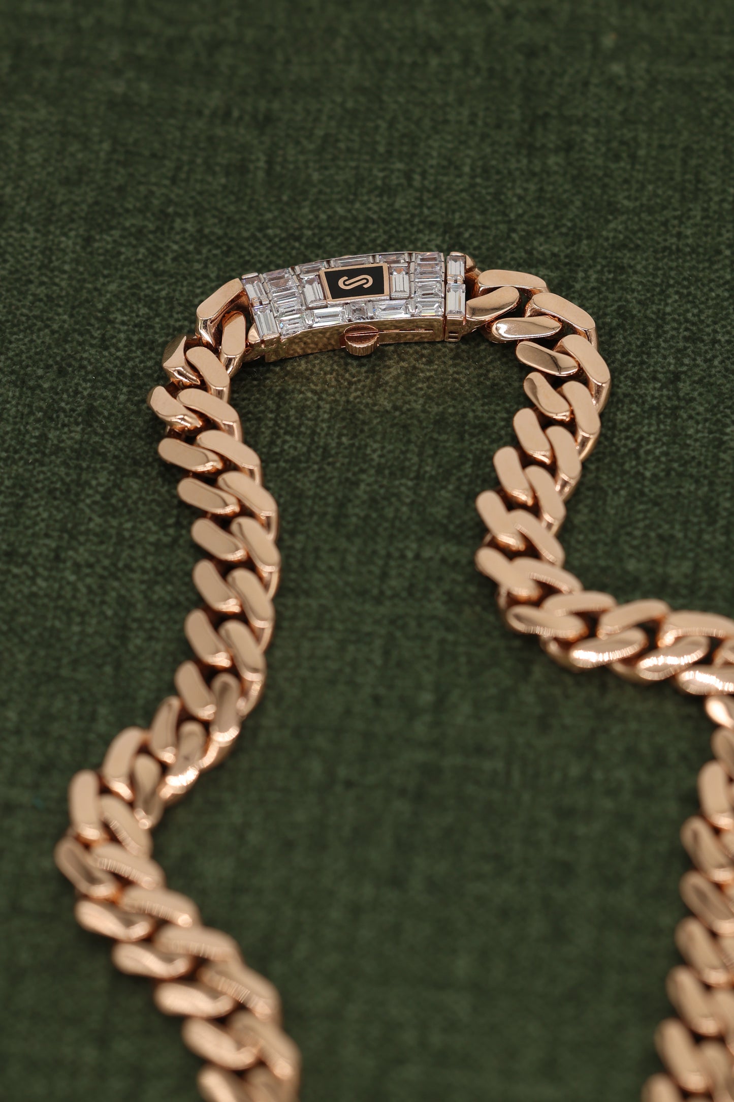 Luxurious Rose Gold Cuban Link Bracelet with Signature Diamond Lock