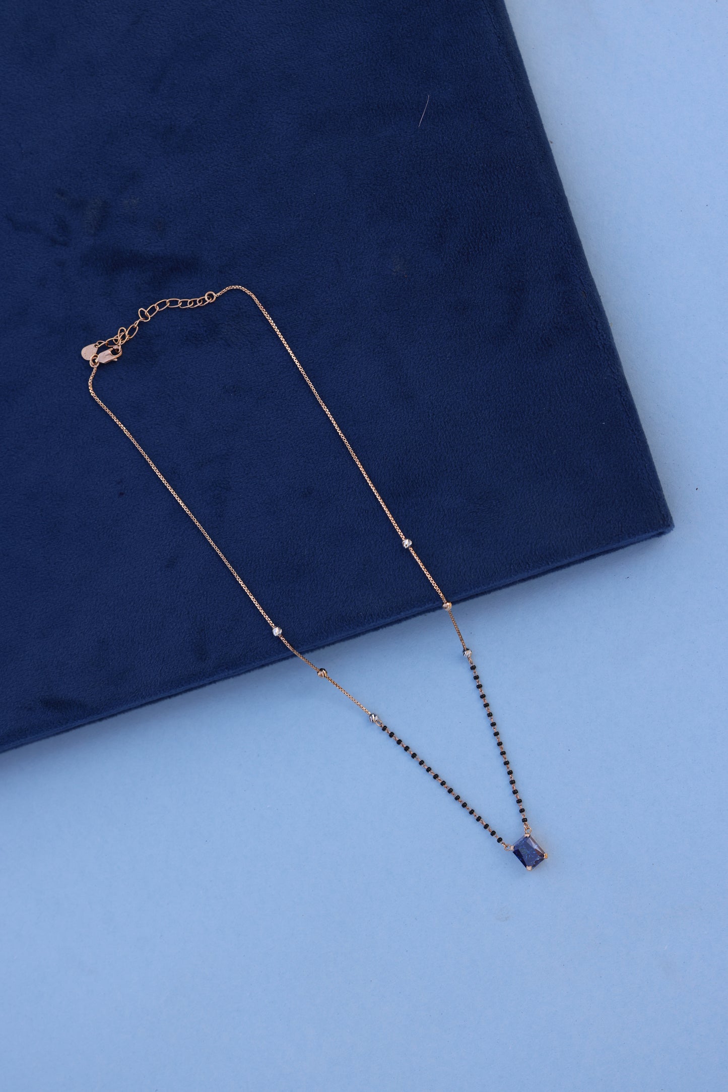Rose Gold Mangalsutra Necklace with Blue American Diamond Pendant – Graceful & Contemporary