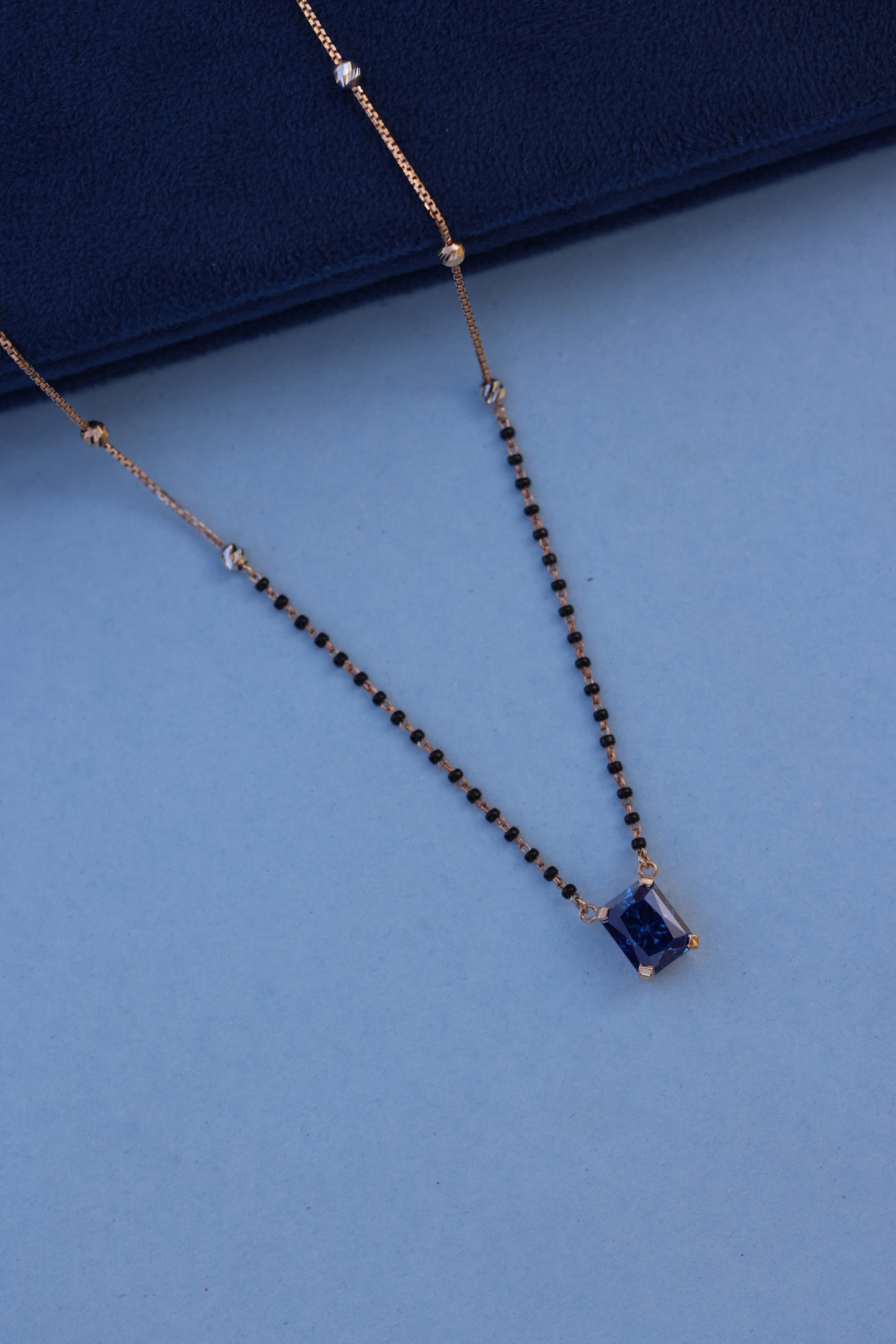 Rose Gold Mangalsutra Necklace with Blue American Diamond Pendant – Graceful & Contemporary