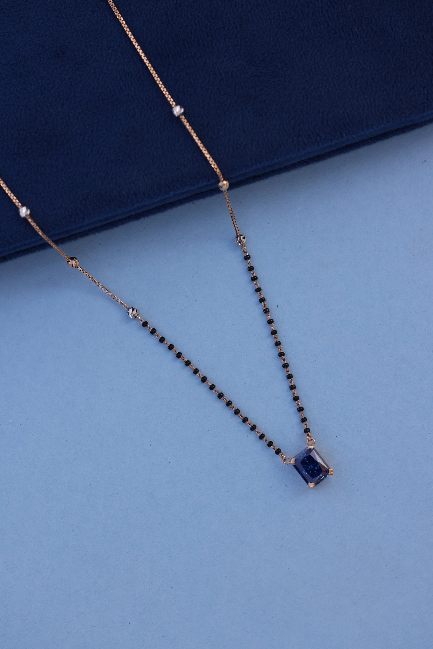 Rose Gold Mangalsutra Necklace with Blue American Diamond Pendant – Graceful & Contemporary