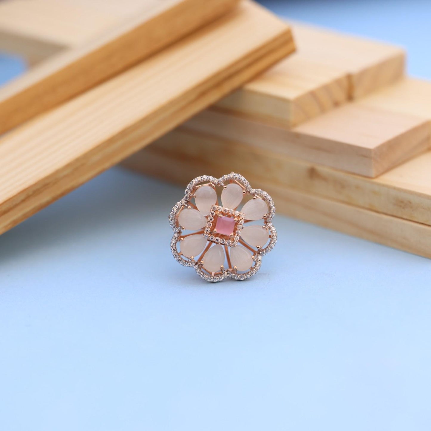 "Elegant Rose Gold Floral Ring with Pink Gemstone & White Accents"