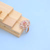 "Elegant Rose Gold Floral Ring with Pink Gemstone & White Accents"
