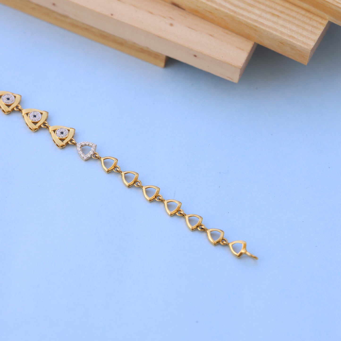 Designer Gold Bracelet with American Diamonds – Stylish Triangle Pattern