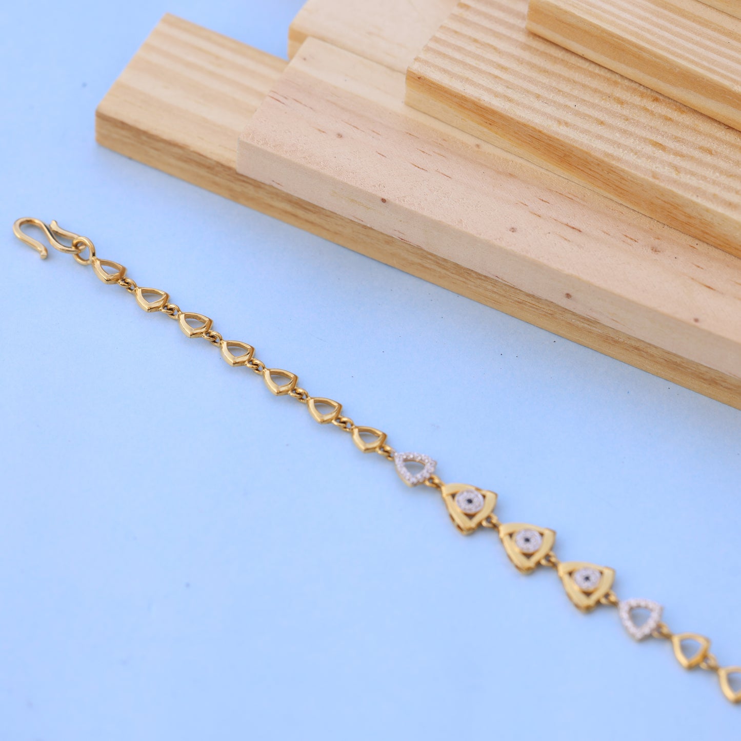 Designer Gold Bracelet with American Diamonds – Stylish Triangle Pattern