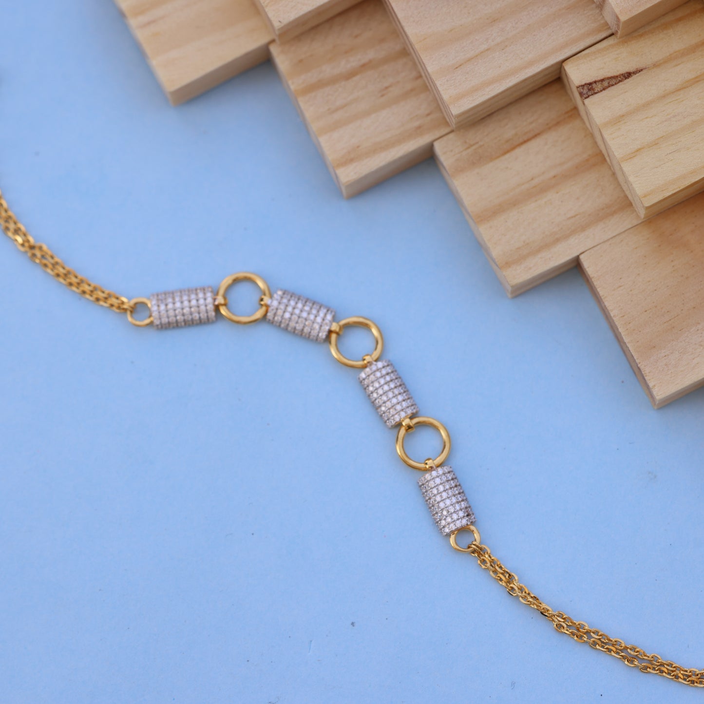 Elegant Gold Bracelet with American Diamond
