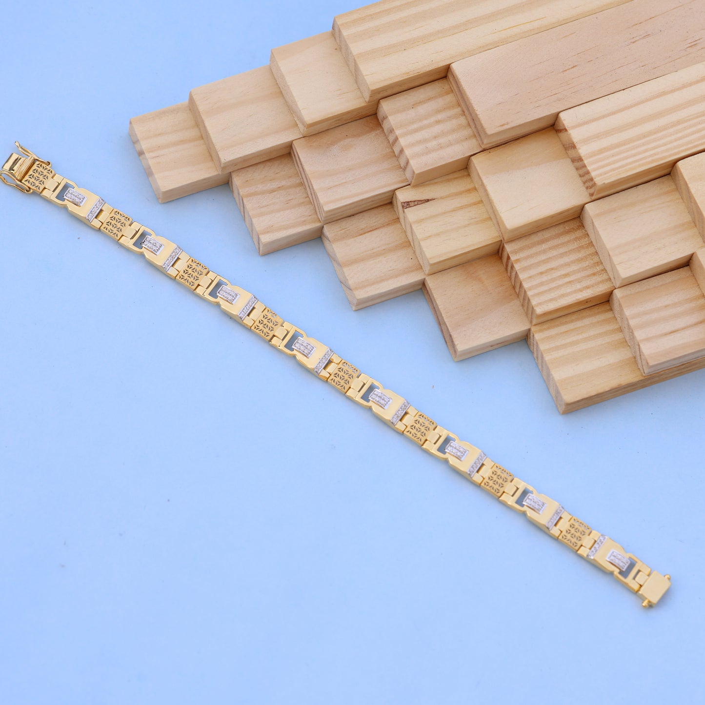 Gold Men Bracelet with Designer Pattern & American Diamonds