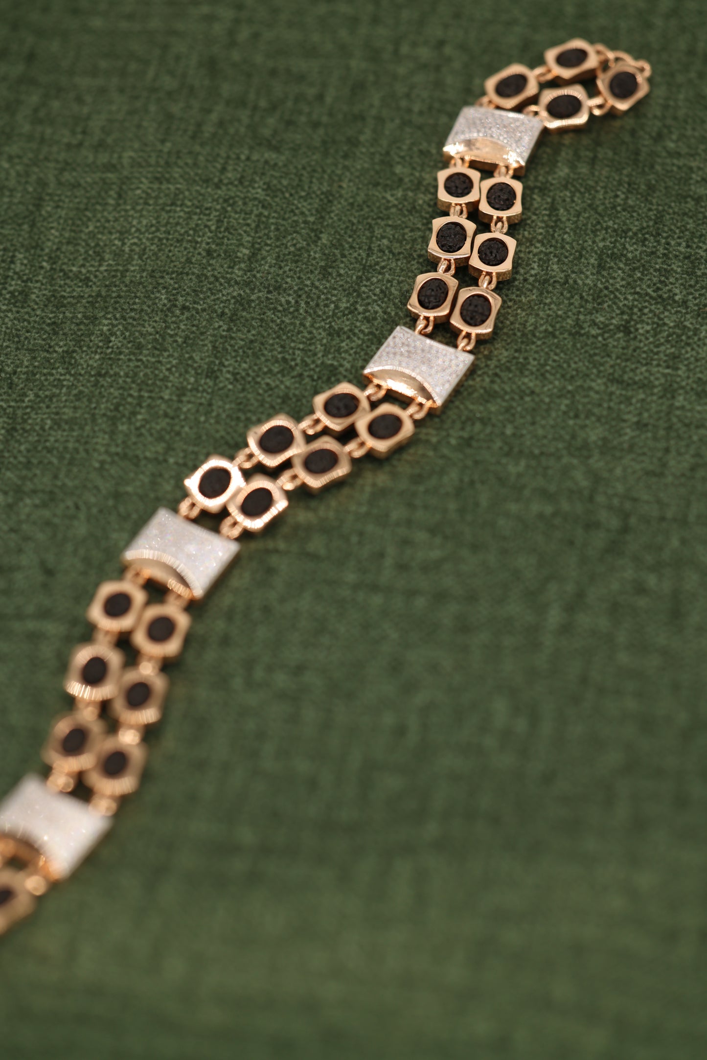 Gold and Black Rudraksha Bracelet with Textured Accent Bars – Spiritual Energy and Elegant Style