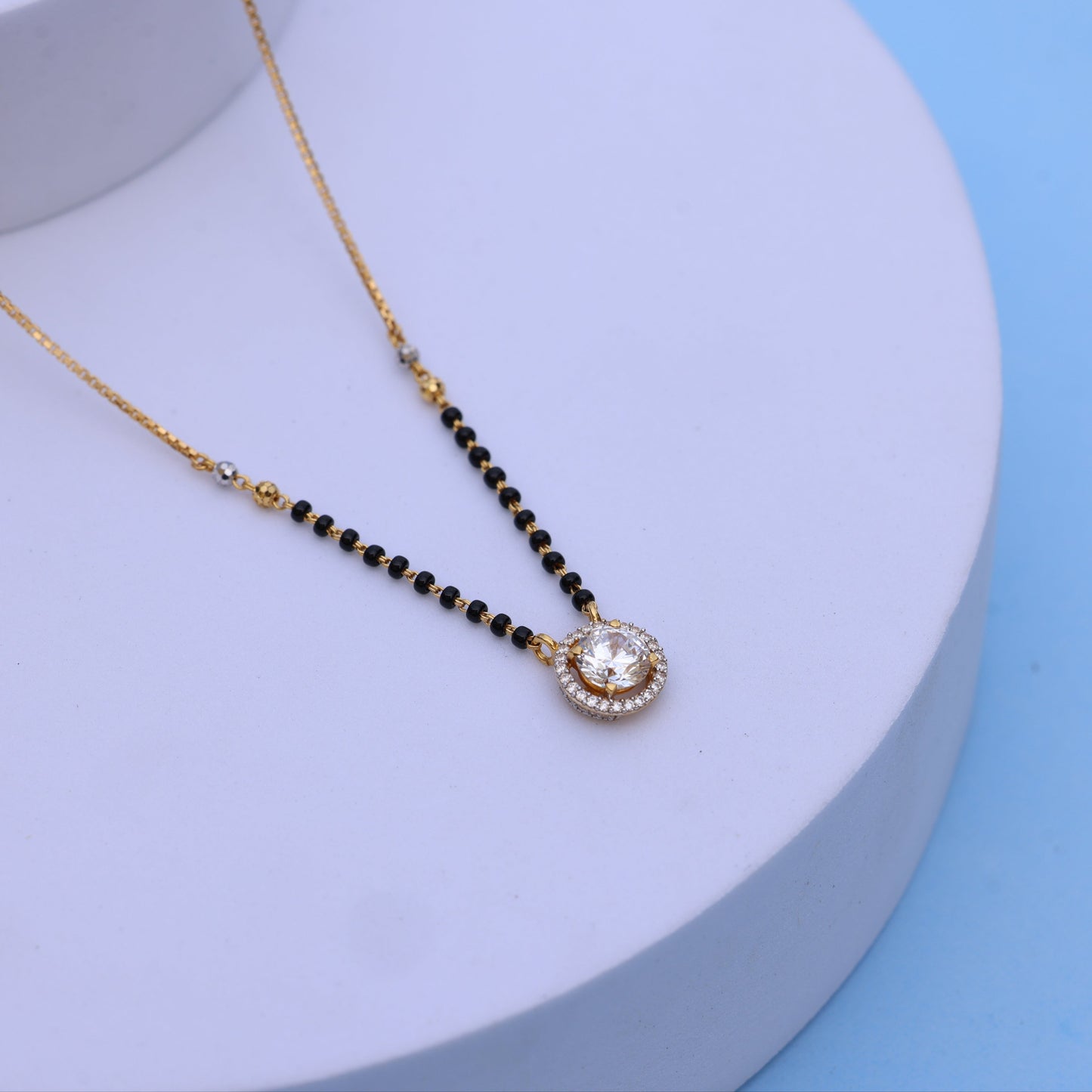 Gold Mangalsutra with Sparkling American Diamond Pendant