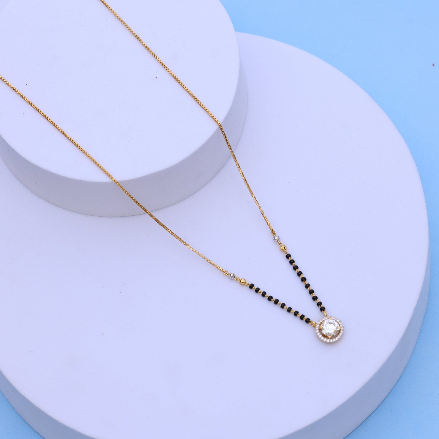 Gold Mangalsutra with Sparkling American Diamond Pendant