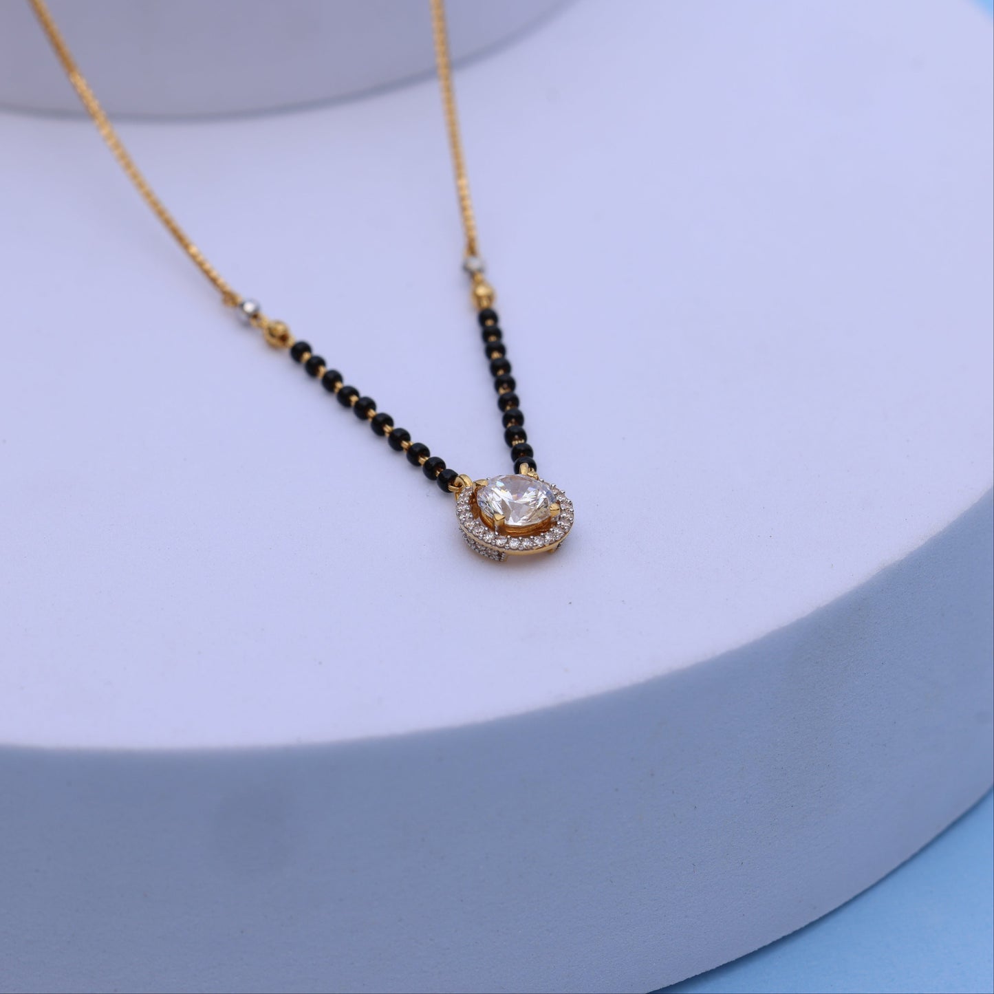 Gold Mangalsutra with Sparkling American Diamond Pendant