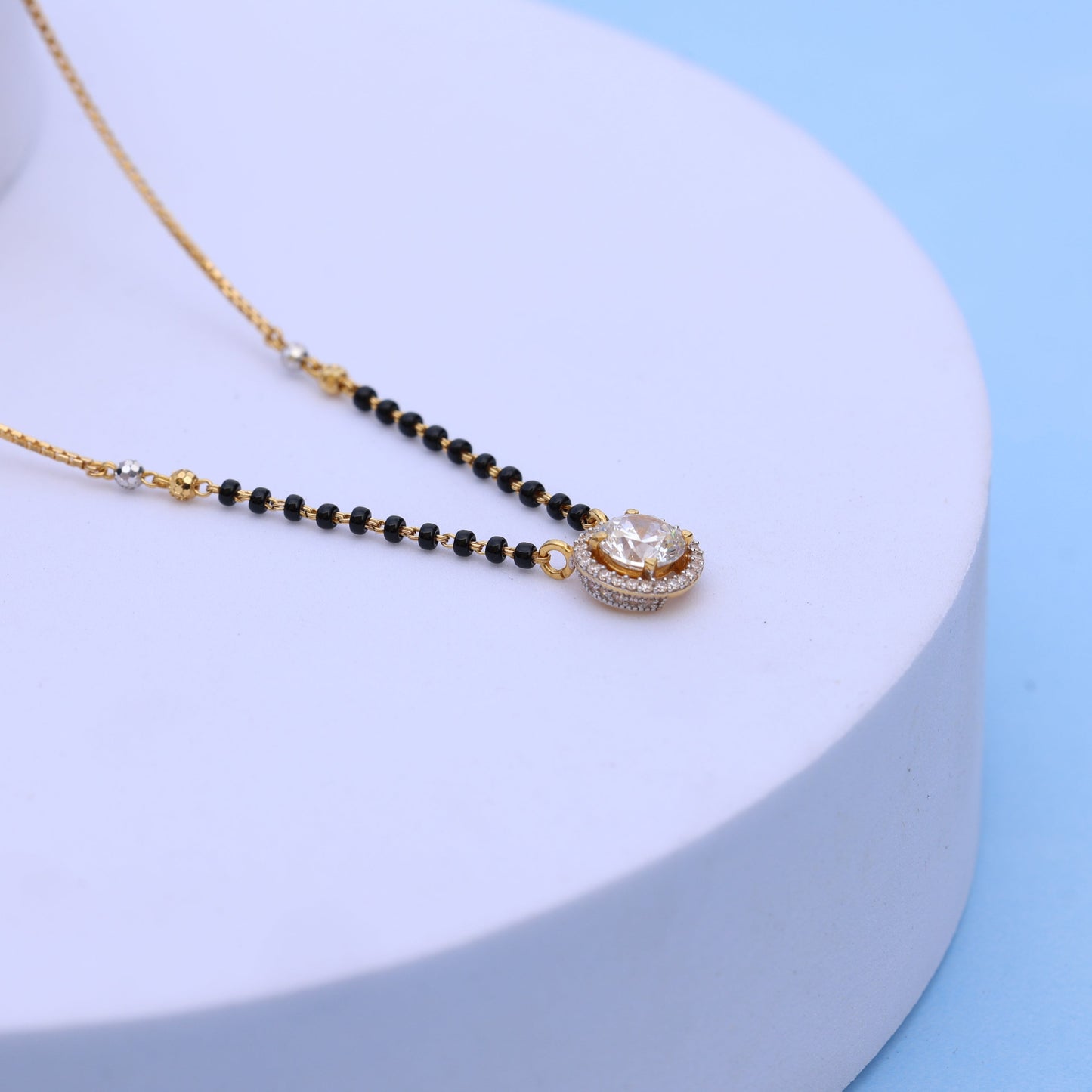 Gold Mangalsutra with Sparkling American Diamond Pendant