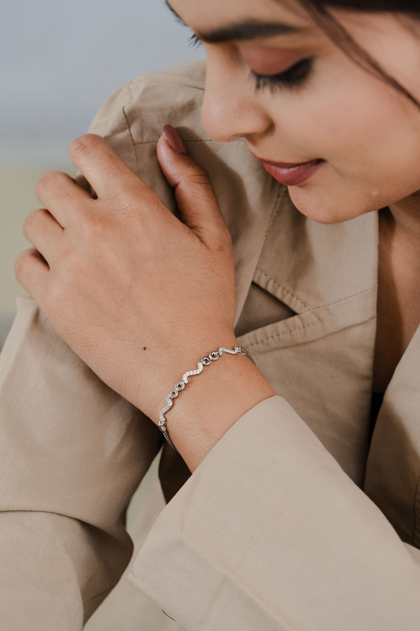 Silver Wave Link Bracelet with American Diamonds