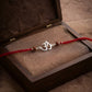 Divine Om Silver Rakhi with Natural Rudraksha Beads