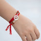 Sacred Om Silver Rakhi with Rudraksha Beads