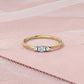 Marquise & Round Diamond Three-Stone Ring in 14K Yellow Gold