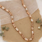 Luxurious Rose Gold Necklace with Greek Key Design and Micro-Pave Diamond Detailing