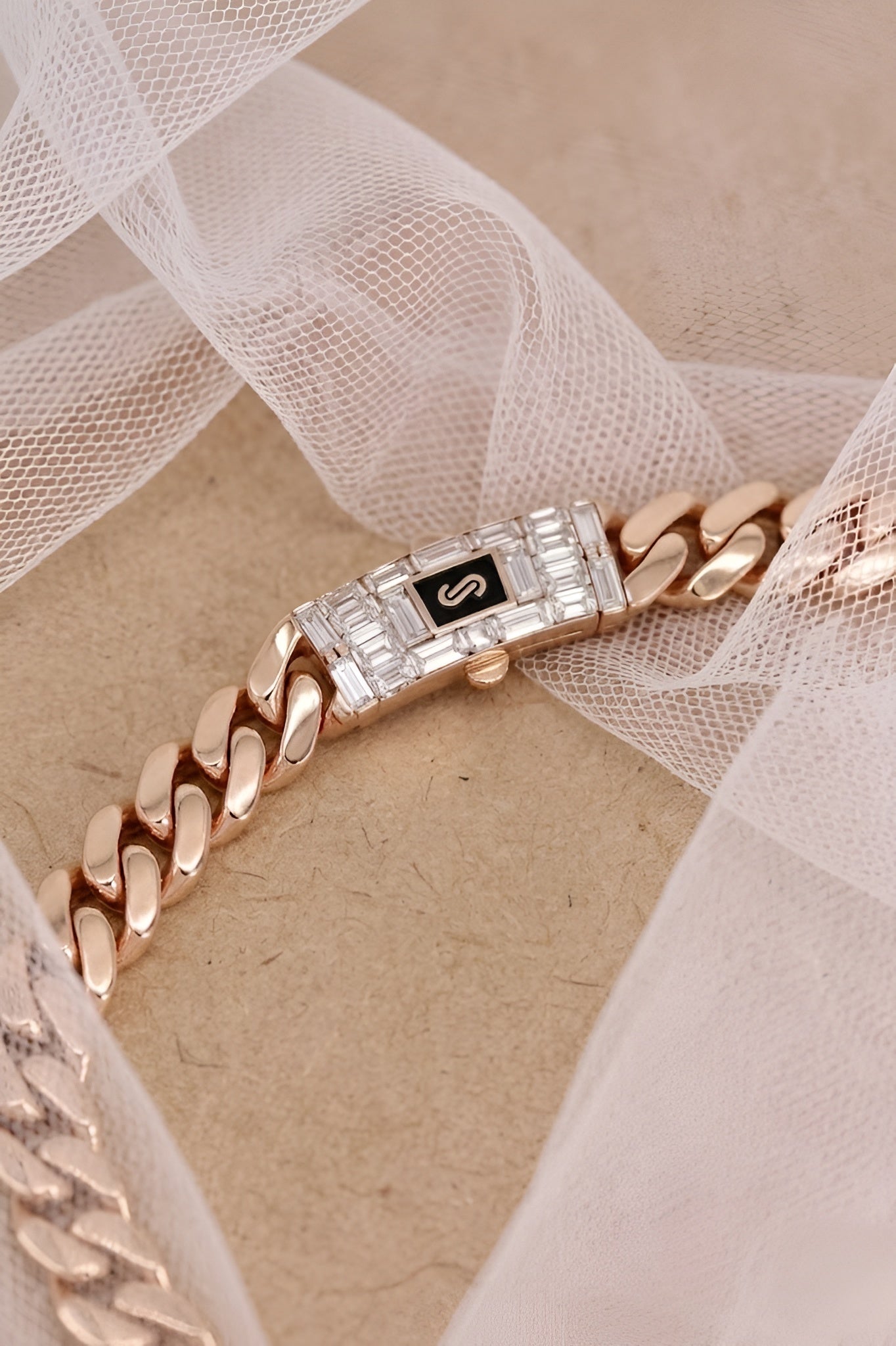 Luxurious Rose Gold Cuban Link Bracelet with Signature Diamond Lock